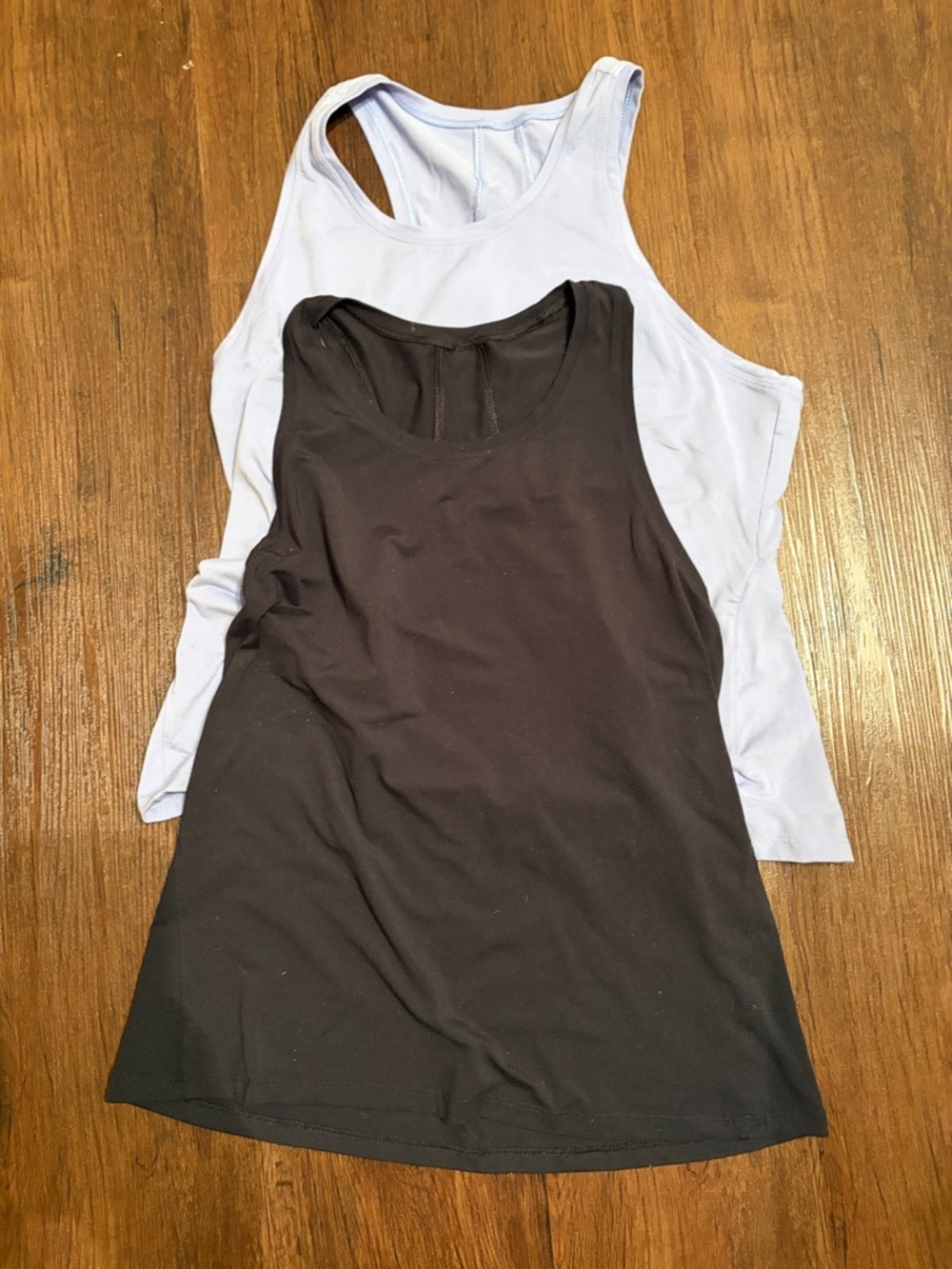 Unbranded set of 2 Tanks black  blue athletic performance women sz XS EUC
Poly